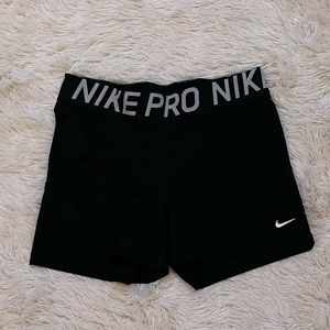 Black Nike Pro athletic shorts